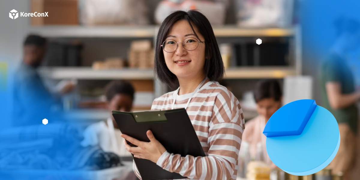 Smiling woman holding clipboard in small business setting with shelves and people in the background, highlighting how small businesses need capital to thrive.