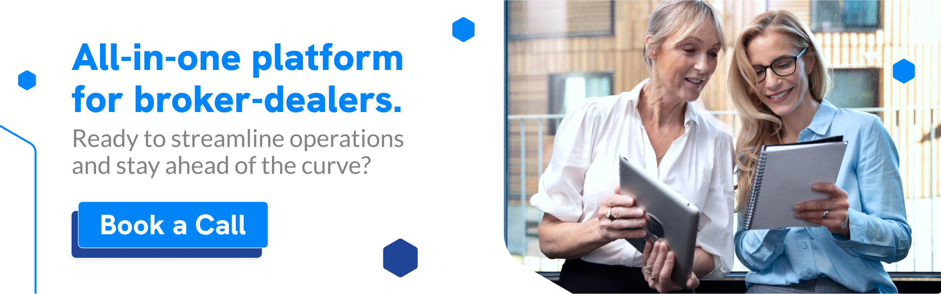 Image of two professional using a platform for broker-dealers in a tablet